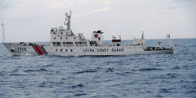 Image provided by the Japan Coast Guard on September 5, 2013 shows a Chinese coastguard ship cruising near the disputed islets known as the Senkakus in Japan and Diaoyus in China, in the East China Sea.