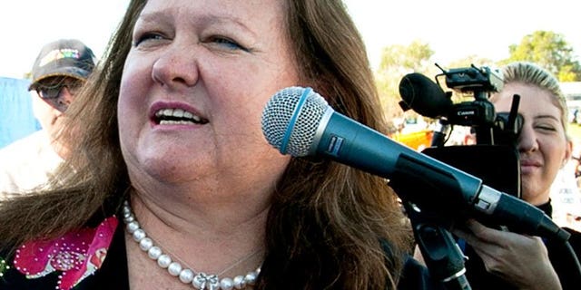 Australia's richest person Gina Rinehart speaks during a rally in Perth on June 9, 2010. The world's richest woman Gina Rinehart is believed to have increased her holding in Australian media group Fairfax to more than 15 percent, reports said on June 15.??AFP PHOTO / Tony ASHBY