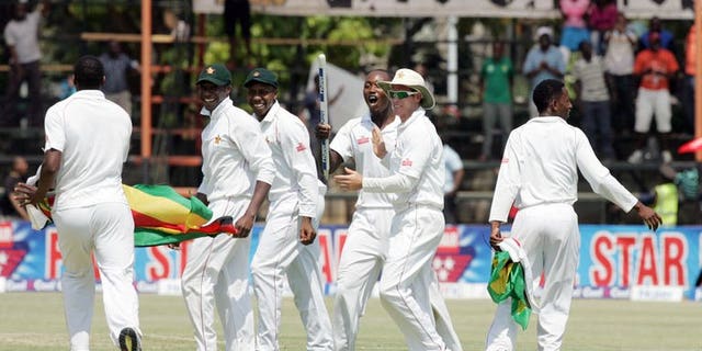 Zimbabwe players celebrate victory over Pakistan on September 14, 2013 during the fifth day of the second Test against at the Harare Sports Club. Former Pakistan cricket greats and fans have demanded a new national team captain and coach after an embarrassing defeat against minnows Zimbabwe.