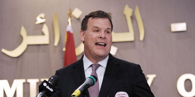 Canadian Foreign Affairs Minister John Baird attends a press conference in Algiers, on September 15, 2013.
