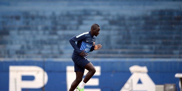 French international defender Mamadou Sakho runs during a training session at the Gremio Stadium in Porto Alegre, Brazil, on June 6, 2013. Sakho, who could make his Liverpool debut at Swansea City on Monday, hopes to repair a career that began to unravel on a wintry night in northwest France in January 2012.
