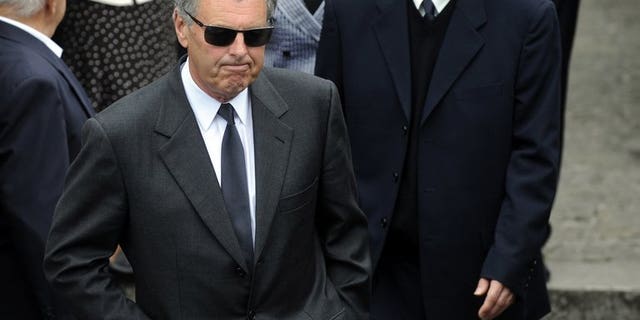 Scottish golfer Bernard Gallacher (C) attends the funeral of Spanish golf legend Severiano Ballesteros in Pedrena, Spain on May 11, 2011.