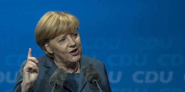 German Chancellor Angela Merkel speaks at an election campaign rally on September 16, 2013 in Potsdam.