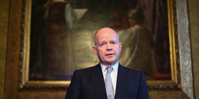 British Foreign Secretary William Hague addresses the media in the Foreign and Commonwealth Office on September 16, 2013 in London.