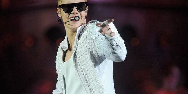 Justin Bieber, pictured during a performance on August 2, 2013 in New York, could upstage even the likes of Fernando Alonso and Lewis Hamilton at this weekend's Formula One Singapore Grand Prix, organisers said Wednesday.