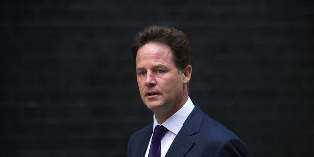British Deputy Prime Minister Nick Clegg arrives at 10 Downing Street in central London on August 27, 2013.