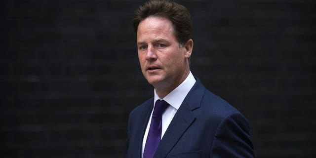 British Deputy Prime Minister Nick Clegg arrives at 10 Downing Street in central London on August 27, 2013.
