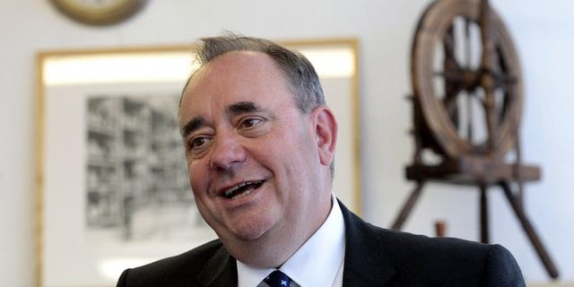 Alex Salmond, Scotland's leader of the Scottish National Party (SNP) and first minister, visits the Barrie Knitwear factory in Hawick, Scotland, on August 20, 2013.