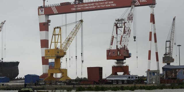 An almost inoperative dock at Vinashin's Nam Trieu shipbuilding factory in the northern coastal city of Hai Phong on February 28, 2013. Vietnam's debt-swamped state-run shipbuilder Vinashin has said it will axe some 14,000 jobs as part of a restructuring that will see it shed 70 percent of its workforce.