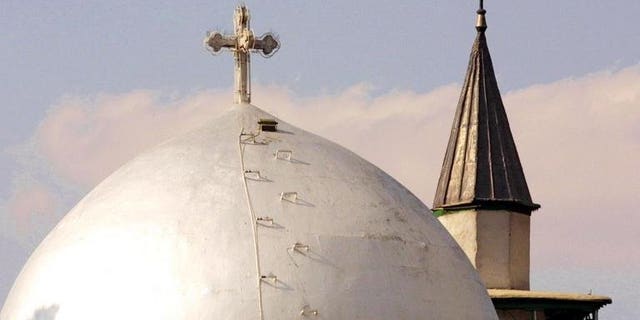 St. Serge Armenian Orthodox church (front) and the Eastern Gate Mosque in Damascus. Christian leaders from Syria and beyond are planning a summit involving Muslim representatives in a drive to use faith to spur peace efforts, the World Council of Churches said Thursday.