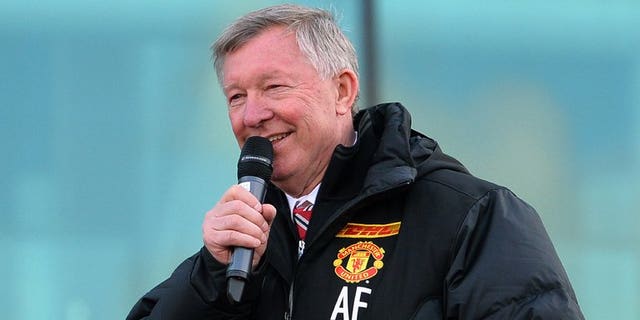 Alex Ferguson addresses crowds outside Old Trafford Stadium in Manchester, on May 13, 2013. Ferguson on Thursday hit back at claims he intentionally influenced officials after ex-referee Mark Halsey revealed his close relationship with the former Manchester United manager.
