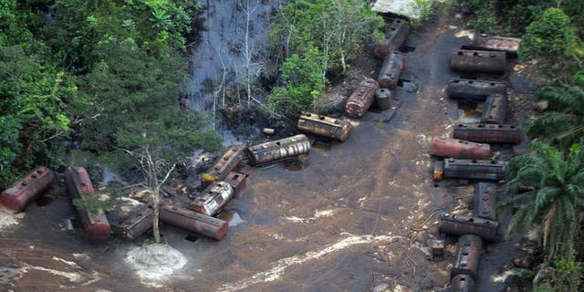 A file picture taken on October 21, 2011 shows Barges laden with stolen oil stationed along the Imo Rivers in the Abia state.