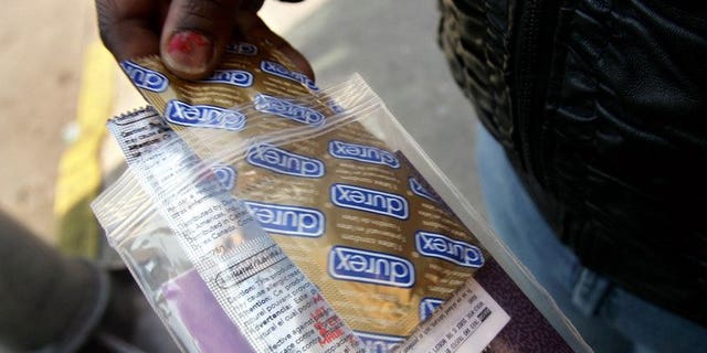 Illustration: the elderly in South Africa are rubbing their arthritis with condoms to ease the pain