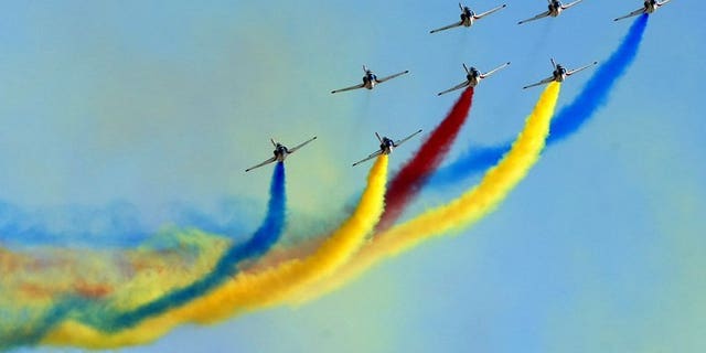File picture shows an air demonstration team pictured during an air show at the Changchun First Aviation Open Day in Changchun, in northeast Chinas Jilin province, on September 1, 2011.