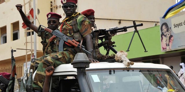 Seleka rebels patrol on a pickup truck in Bangui on March 30, 2013. The African Union on Friday urged the international community to do more in the poor and strife-torn Central African Republic, describing the situation there as "dire".