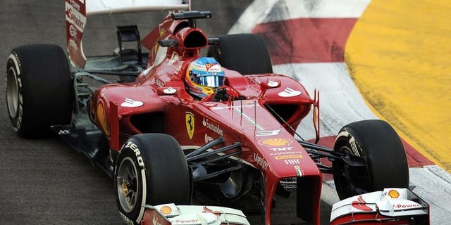 Fernando Alonso drives in the first practice session on September 20, 2013 for the Singapore Grand Prix. McLaren confirmed Friday they are open to the shock return of Ferrari's Fernando Alonso in what would be one of Formula One's most sensational coups.