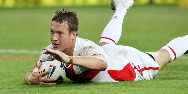 England's Danny McGuire, in action on November 15, 2008, scored a late drop-goal to put defending Super League champions Leeds into the play-off semi-finals as they sealed an 11-10 win over familiar foes St Helens at Headingley