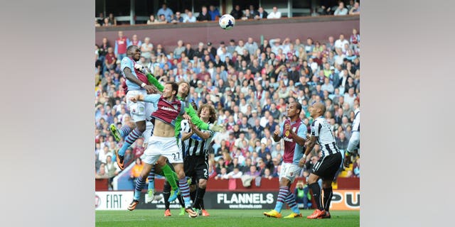 Aston Villa's Belgian striker Christian Benteke (left) at Villa Park in Birmingham, West Midlands, England, on September 14, 2013. Villa manager Paul Lambert played down the gravity of an injury that forced key striker Christian Benteke off during his side's 1-0 win at Norwich City on Saturday.