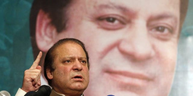 Pakistan's then incoming Prime Minister Nawaz Sharif addresses his party's newly elected MPs in Lahore on May 20, 2013.