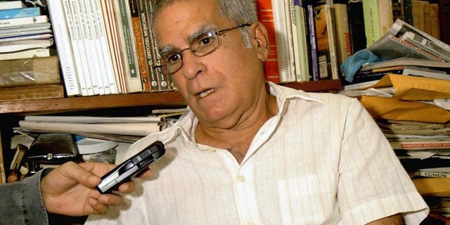 A file picture taken on November 29, 2004 shows Cuban dissident Oscar Espinosa Chepe speaking during an interview at his house in Havana.