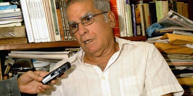 A file picture taken on November 29, 2004 shows Cuban dissident Oscar Espinosa Chepe speaking during an interview at his house in Havana.