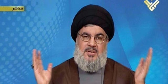 An image grab from Hezbollah's al-Manar TV shows Hassan Nasrallah, head of Hezbollah, on September 23, 2013 in Lebanon.