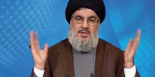 An image grab from Hezbollah's al-Manar TV shows Hassan Nasrallah, head of Hezbollah, on September 23, 2013 in Lebanon.