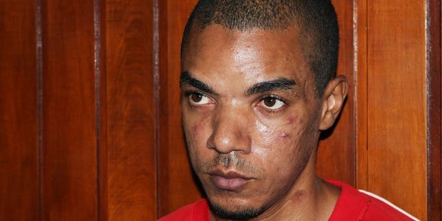 Briton Jermaine Grant sits in court in Kenya's coastal town of Mombasa on May 9, 2012. Grant, accused of ties to Somalia's Al-Qaeda-linked Shebab, appeared in a Kenyan court on Tuesday on explosives charges.