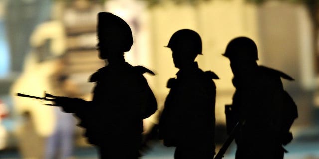 In this photograph taken on November 28, 2008, Indian Army soldiers take their positions outside the Taj Mahal Hotel in Mumbai. The chilling siege in Nairobi has resonated deeply in the Indian megacity, where militants staged a three-day rampage five years ago in attacks on a range of targets including luxury hotels.