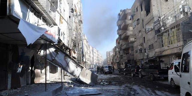Smoke billows from the Damascus suburb of Tadamun during heavy fighting on August 4, 2012. A deadly blast hit the Tadamun neighbourhood of south Damascus on Tuesday, Syrian state television reported, without immediately giving any casualty figures.