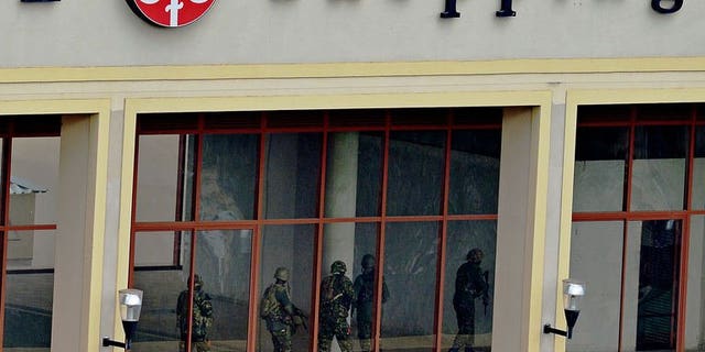 Kenyan soldiers clear the top floor of the Westgate mall in Nairobi on September 24, 2013.