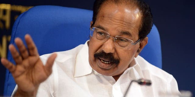 Indian Minister for Petroleum and Natural Gas, Veerappa Moily addresses a press conference during the unveiling of a mega fuel conservation campaign in New Delhi on September 24, 2013.