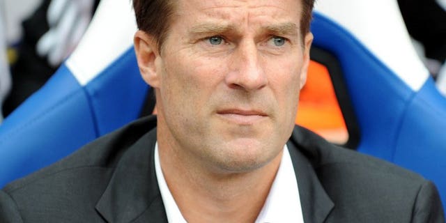 Swansea City's Danish manager Michael Laudrup watches during the English Premier League football match between Crystal Palace and Swansea City at Selhurst Park in south London on September 22, 2013.