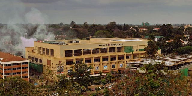 Smoke rises from the Westgate mall on September 24, 2013 in Nairobi.