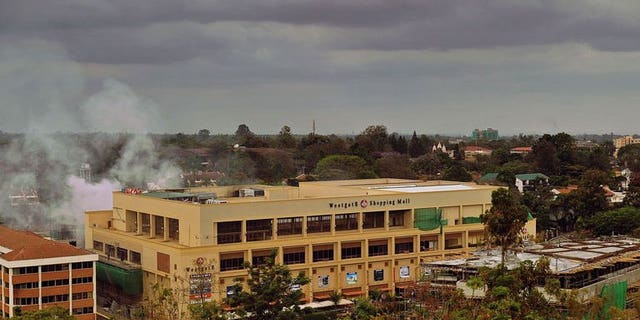 Smoke rises from the Westgate mall on September 24, 2013 in Nairobi.