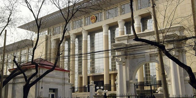 The Chinese Supreme People's Court in Beijing upheld on September 25, 2013, a death sentence against a street food vendor who stabbed two urban security officials following a street dispute, provoking outrage online.