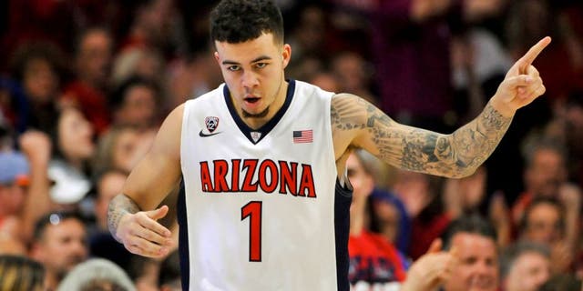 Feb 14, 2016; Tucson, AZ, USA; Arizona Wildcats guard Gabe York (1) celebrates after scoring against the Southern California Trojans during the first half at McKale Center. Mandatory Credit: Casey Sapio-USA TODAY Sports