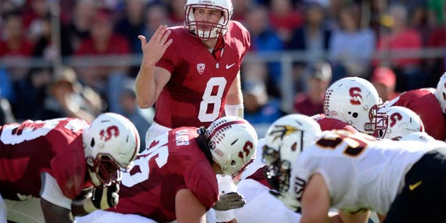 Sep 21, 2013; Stanford, CA, USA; Stanford Cardinal quarterback Kevin Hogan (8) changes a play at the line during the first quarter against the Arizona State Sun Devils at Stanford Stadium. Mandatory Credit: Bob Stanton-USA TODAY Sports