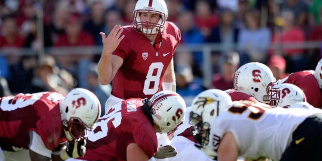 Sep 21, 2013; Stanford, CA, USA; Stanford Cardinal quarterback Kevin Hogan (8) changes a play at the line during the first quarter against the Arizona State Sun Devils at Stanford Stadium. Mandatory Credit: Bob Stanton-USA TODAY Sports