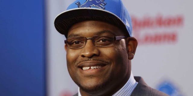 Detroit Lions first round draft pick guard Laken Tomlinson addresses the media during a news conference on Friday, May 1, 2015 in Allen Park, Mich. (AP Photo/Carlos Osorio)