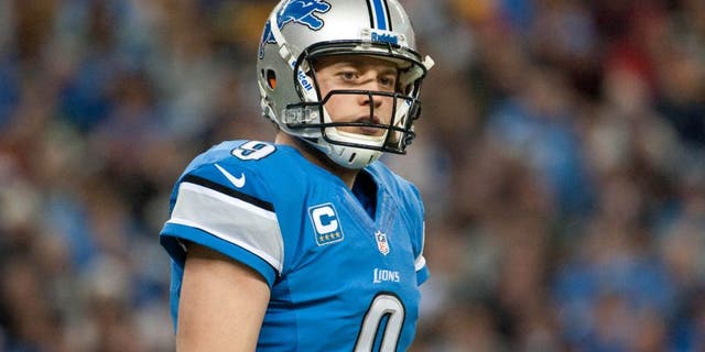 Nov 28, 2013; Detroit, MI, USA; Detroit Lions quarterback Matthew Stafford (9) during the game against the Green Bay Packers during a NFL football game on Thanksgiving at Ford Field. Mandatory Credit: Tim Fuller-USA TODAY Sports