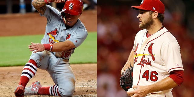 Cardinals second baseman Kolten Wong and pitcher Kevin Siegrist