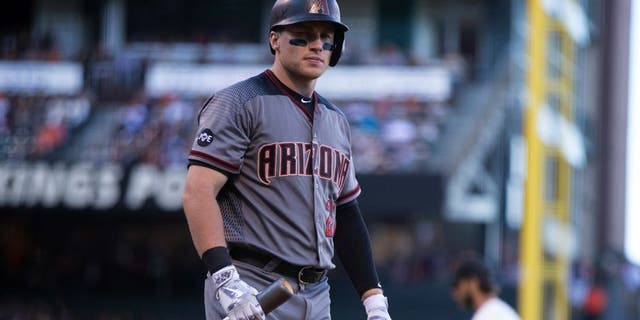 Arizona Diamondbacks' Brandon Drury walks back to the dugout after striking out against San Francisco Giants starting pitcher Madison Bumgarner during the fifth inning of a baseball game on Sunday, July 10, 2016, in San Francisco. (AP Photo/D. Ross Cameron)