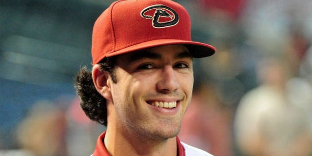 Jul 20, 2015; Phoenix, AZ, USA; First overall pick in the 2015 MLB draft Dansby Swanson looks on after signing with the Arizona Diamondbacks at Chase Field. Mandatory Credit: Matt Kartozian-USA TODAY Sports
