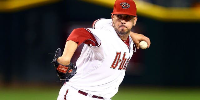 Apr 6, 2015; Phoenix, AZ, USA; Arizona Diamondbacks pitcher Oliver Perez against the San Francisco Giants during opening day at Chase Field. Mandatory Credit: Mark J. Rebilas-USA TODAY Sports