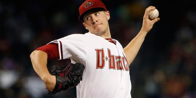 Arizona Diamondbacks' Patrick Corbin throws a pitch against the Milwaukee Brewers during the first inning of a baseball game Friday, July 24, 2015, in Phoenix. (AP Photo/Ross D. Franklin)