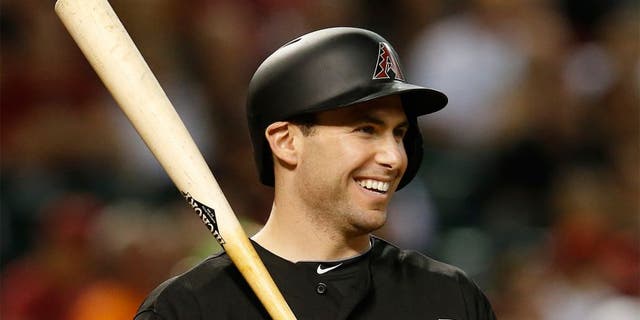 FILE - In this June 6, 2015, file photo, Arizona Diamondbacks Paul Goldschmidt reacts while being intentionally walked in the eighth inning of a baseball game against the New York Mets in Phoenix. Goldschmidt is having a season as good as anyone in the majors. Yet the attention he receives nationally is far less thant the other so-called big names in the game. His response? "I couldn't care less." (AP Photo/Rick Scuteri, File)