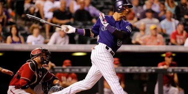 at Coors Field on September 2, 2015 in Denver, Colorado.