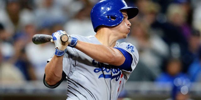 Apr 6, 2016; San Diego, CA, USA; Los Angeles Dodgers shortstop Corey Seager (5) follows through during the seventh inning against the San Diego Padres at Petco Park. Mandatory Credit: Jake Roth-USA TODAY Sports