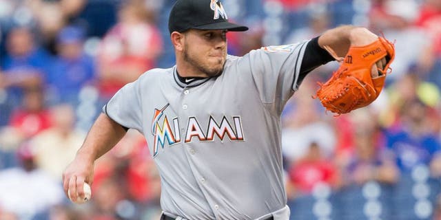 Jul 17, 2015; Philadelphia, PA, USA; Miami Marlins starting pitcher Jose Fernandez (16) pitches against the Philadelphia Phillies during the first inning at Citizens Bank Park. Mandatory Credit: Bill Streicher-USA TODAY Sports